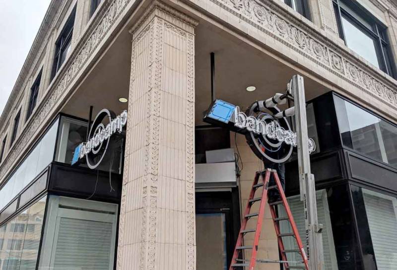 Signage at Bandcamp's new Oakland offices goes up on Jan. 17, 2019.