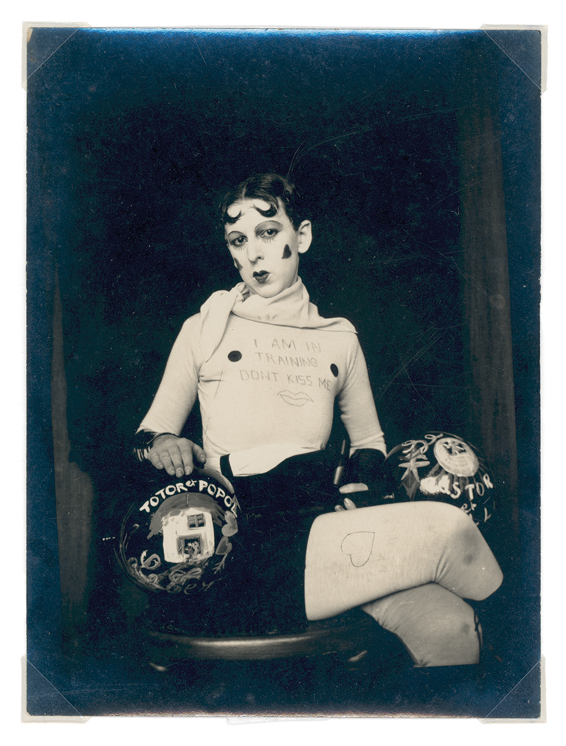 Claude Cahun (Lucy Schwob) and Marcel Moore (Suzanne Malherbe), 'Untitled' [I am in training don't kiss me], 1927.