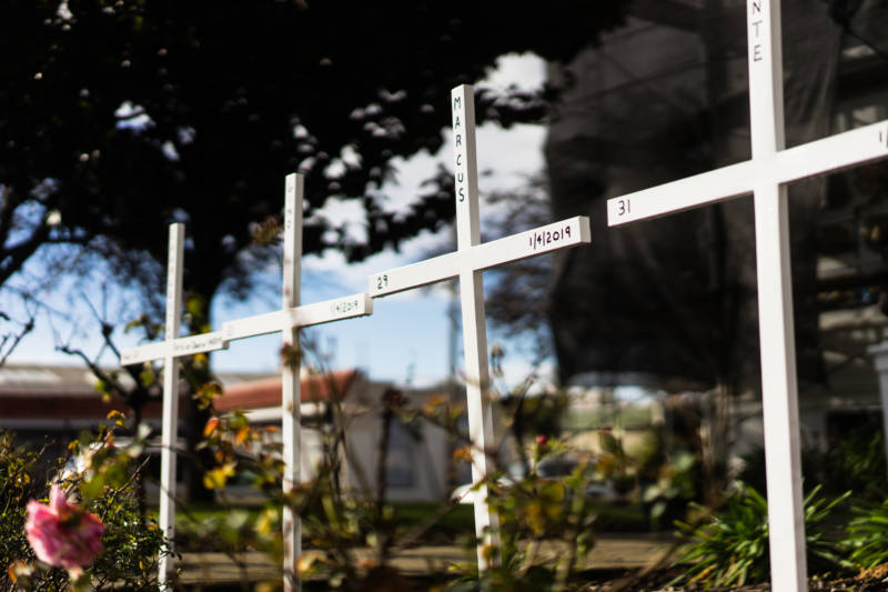 Memorial crosses for homicide victims are erected at St. Columba Catholic Church in Oakland, Calif. In East Oakland, where gun violence is chronic, some are grateful that America is paying more attention to it — but they would also like a focus on neighborhoods like theirs.