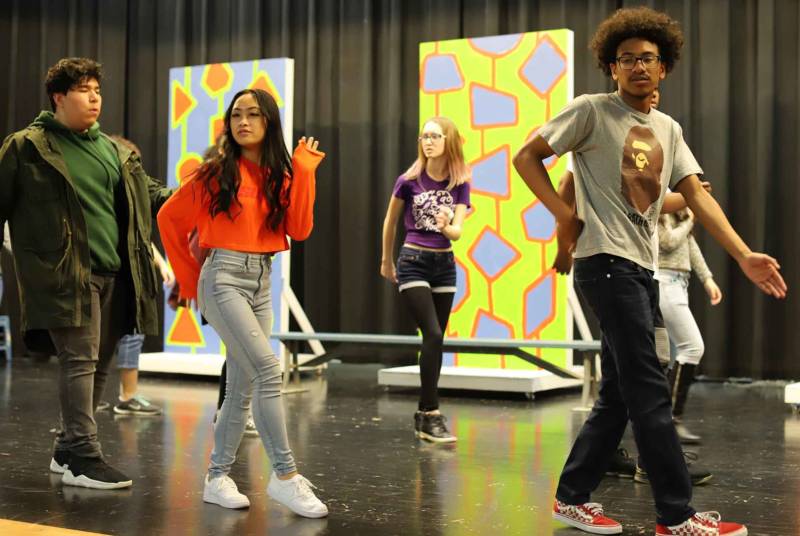 The cast of 'Hairspray' rehearses at Oakland High School.