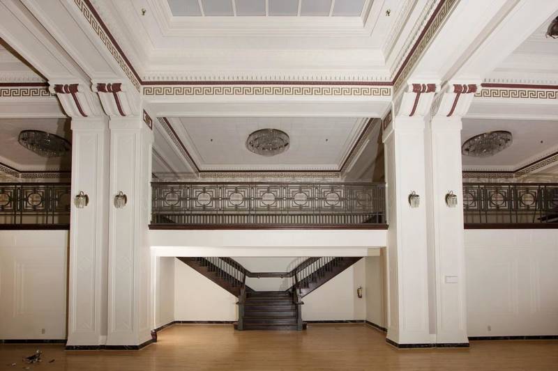 A ballroom staircase and balcony at the Oakland Civic Auditorium.