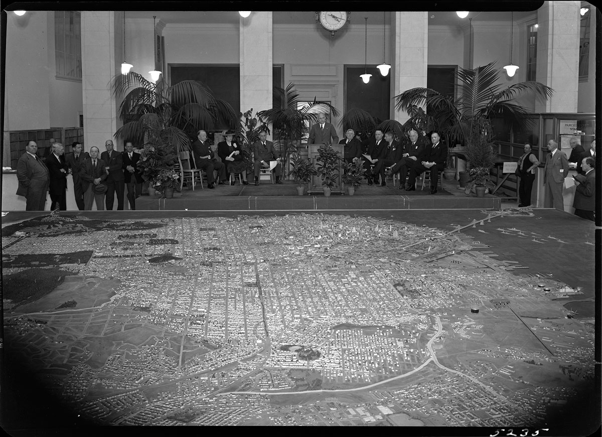 Unveiling of the scale model of San Francisco at City Hall, 1940; WPA, San Francisco Department of City Planning Records, San Francisco History Center.