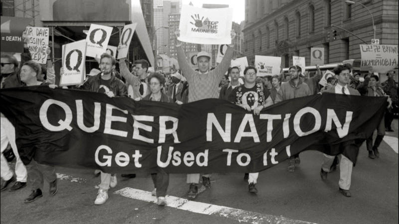 Queer Nation activists march at a New York City peace rally in October 1990.