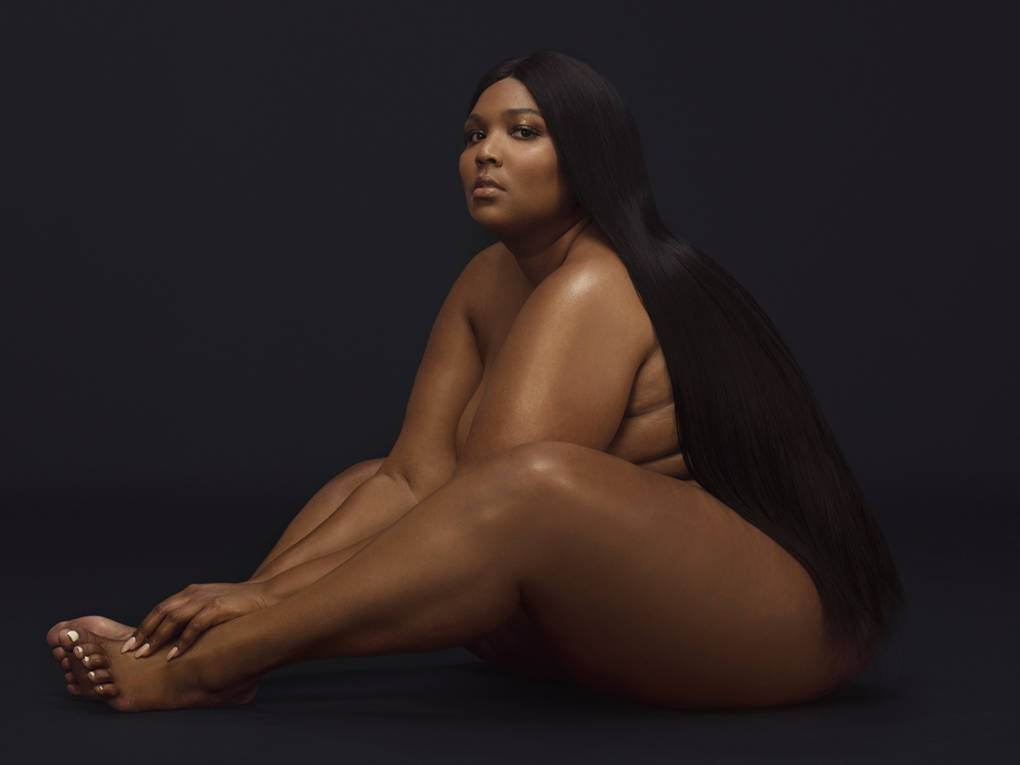 "That was me just so comfortable not trying to cover anything up," Lizzo says of the cover photo for Cuz I Love You.