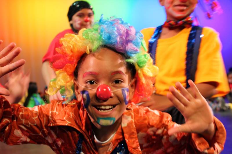 A kid clowning