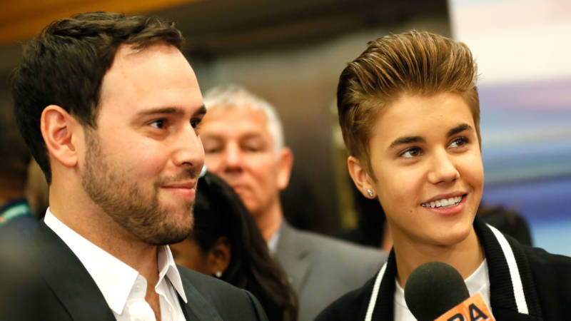 Ithaca Holdings owner Scooter Braun, left, and his management client Justin Bieber, photographed on Apr. 27, 2012 in New York.