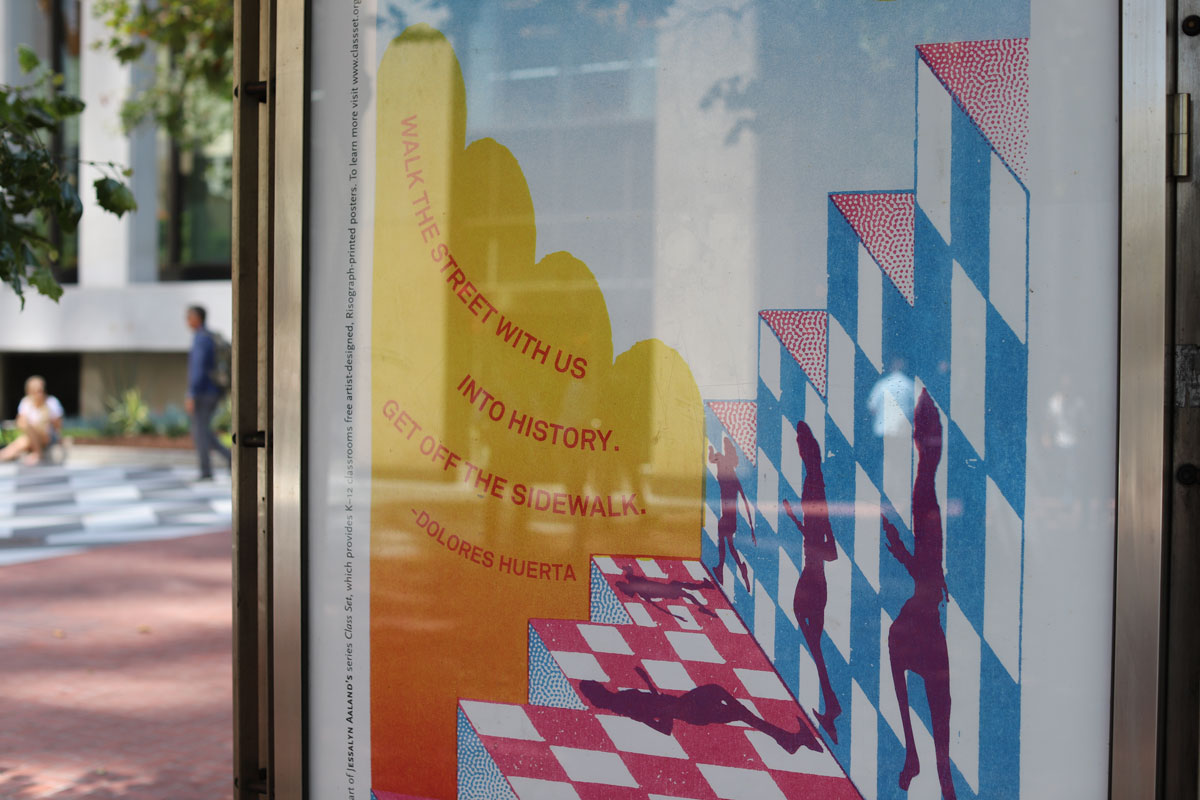 Poster designed by Jesjit Gil in a Market Street bus kiosk.