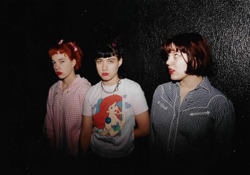 Hanna with her Bikini Kill bandmates Kathi Wilcox (left) and Tobi Vail in the 1990s.