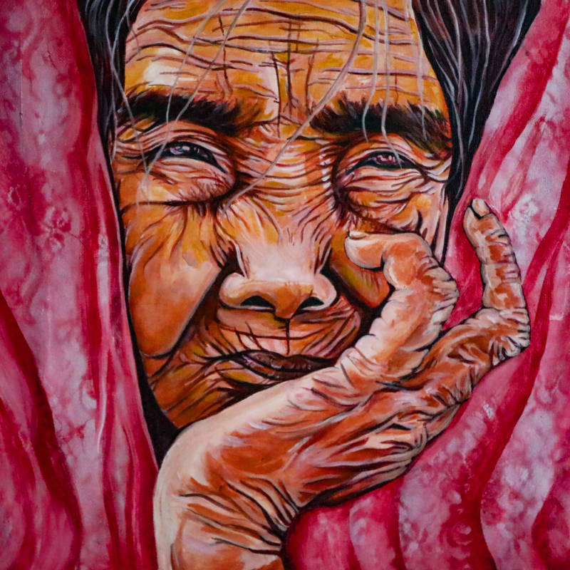 A portrait of Whang-od Oggay from the Butbut community in the Philippines and the world's last mambabatok (hand-tap tattoo artist) from her generation. (courtesy of Cece Carpio)