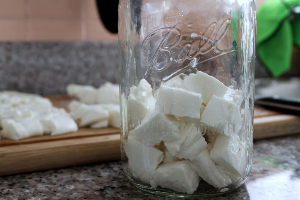 Store the feta in a jar covered in brine (made from extruded whey and salt) for up to 3 weeks. Photo: Kate Williams