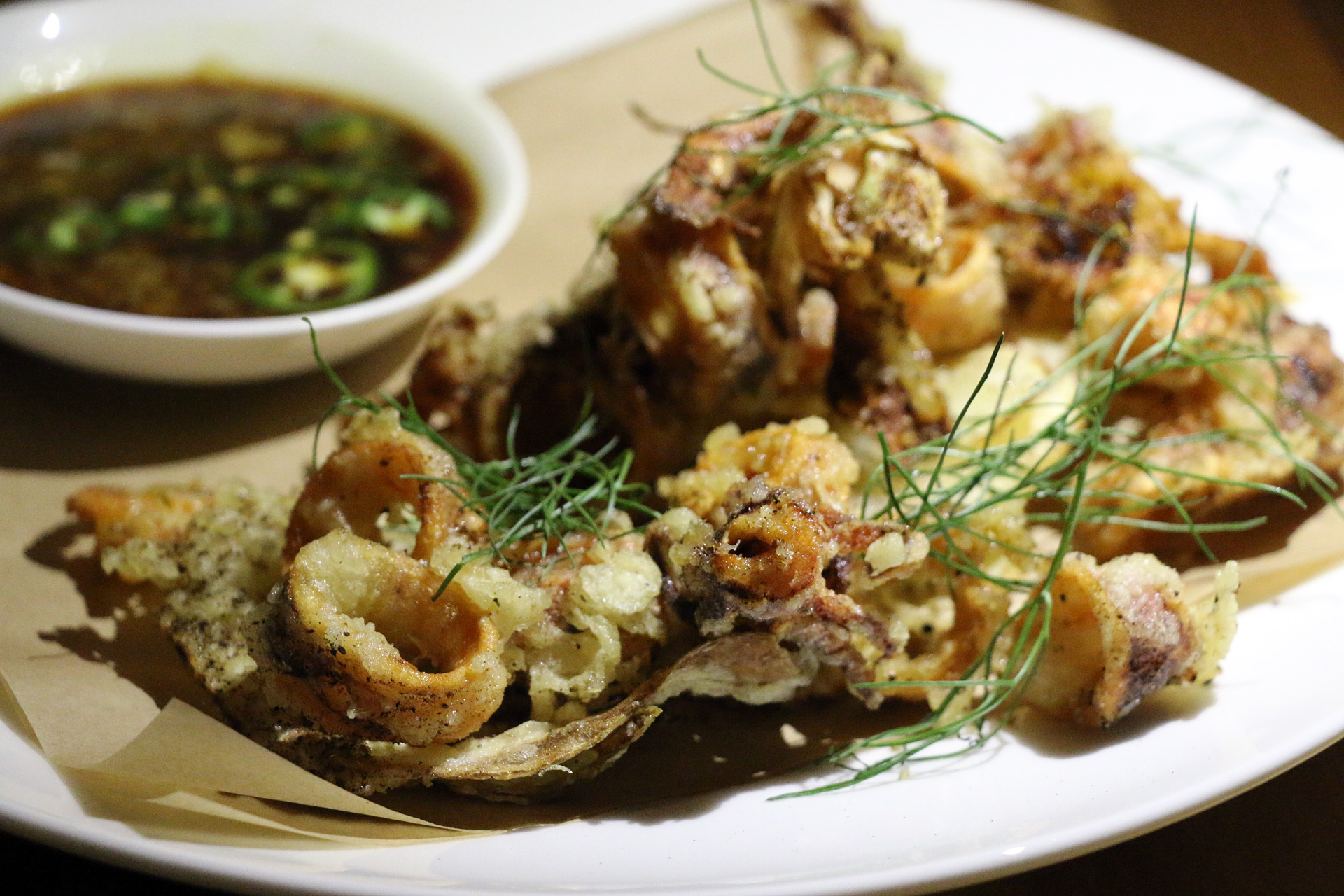 Salt and pepper squid with soy-chile sauce. 