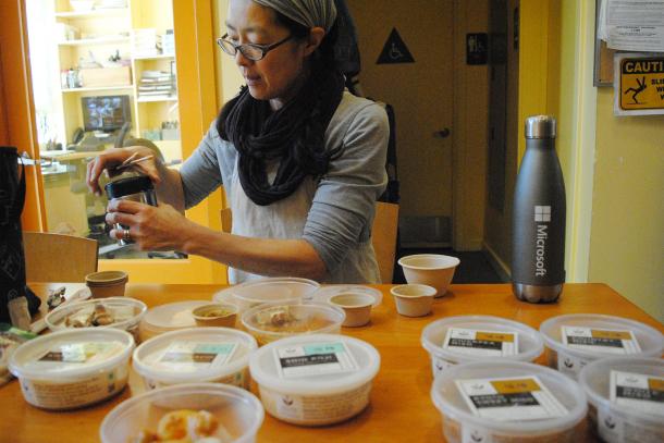 Mariko Grady prepares samples of her products at La Cocina's incubator kitchen.