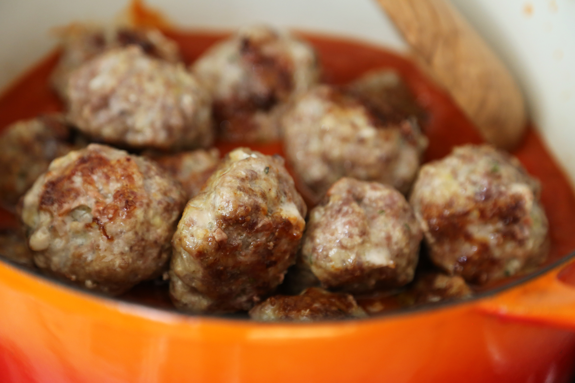 Add the meatballs to the sauce and simmer gently for about 30 minutes to an hour, until tender and the sauce is infused with the meat.