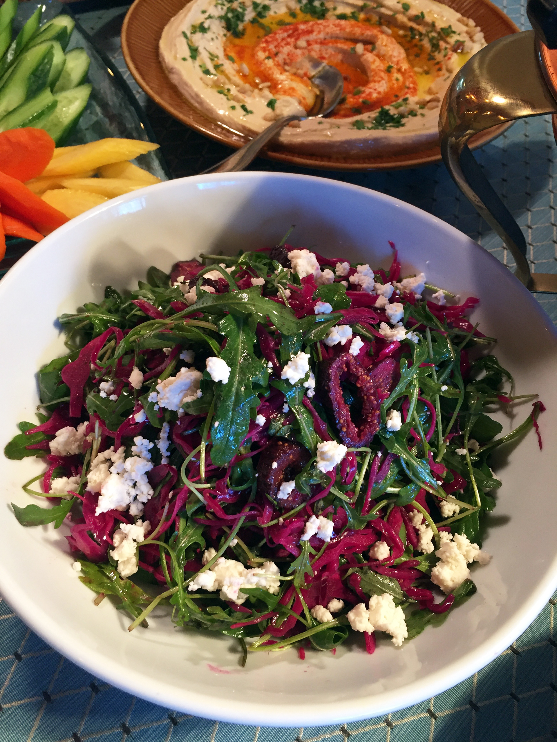 One of Ba-Bite's colorful salads: red cabbage with mung bean sprouts, dried figs, arugula and feta and the creamiest hummus.
