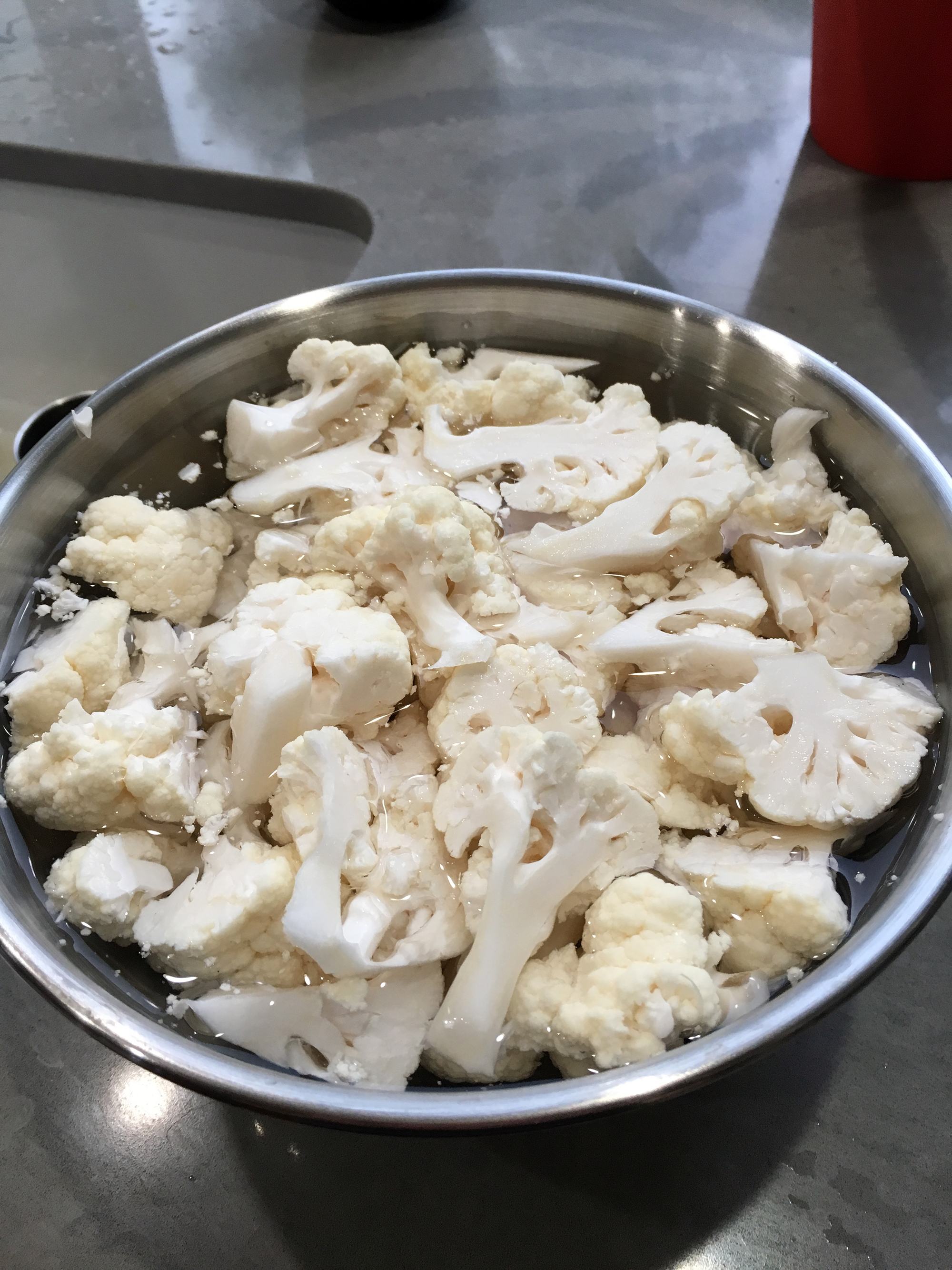 Soak the cauliflower in cold water to cover for about 30 minutes. Drain and set aside.
