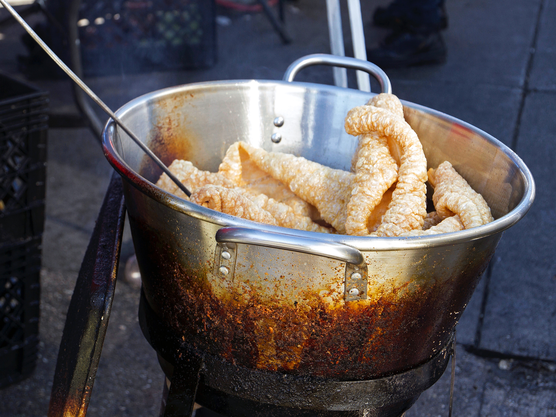 Chicharrones, or pork rinds, fry in the piñata district in Los Angeles.