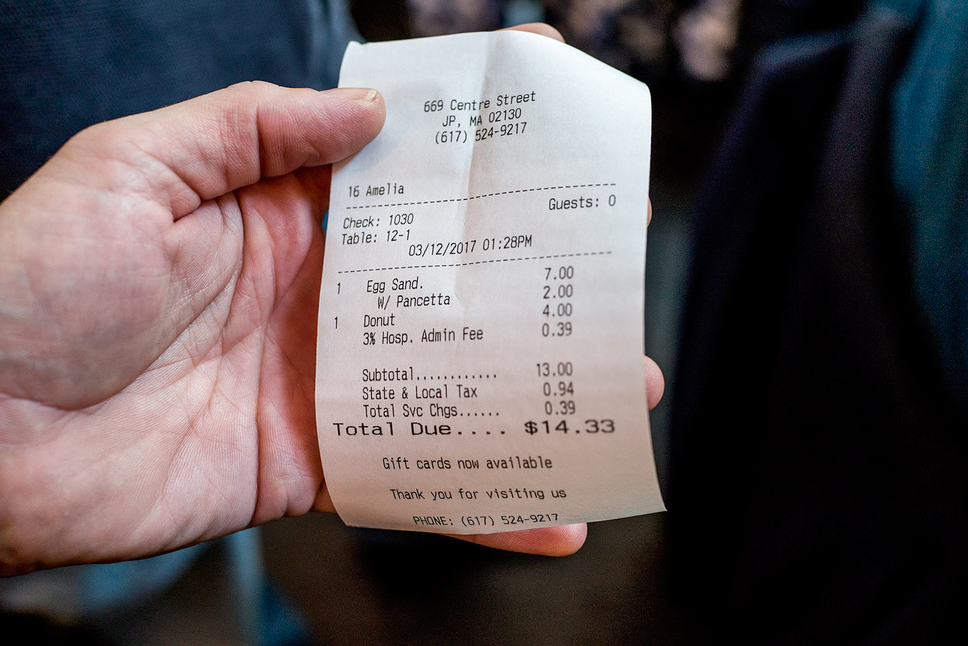 A receipt from Centre Street Café in Boston includes a 3 percent "hospitality administration fee," which comes out to 39 cents on $13 of food sales. The entire fee goes to non-tipped employees in the kitchen.