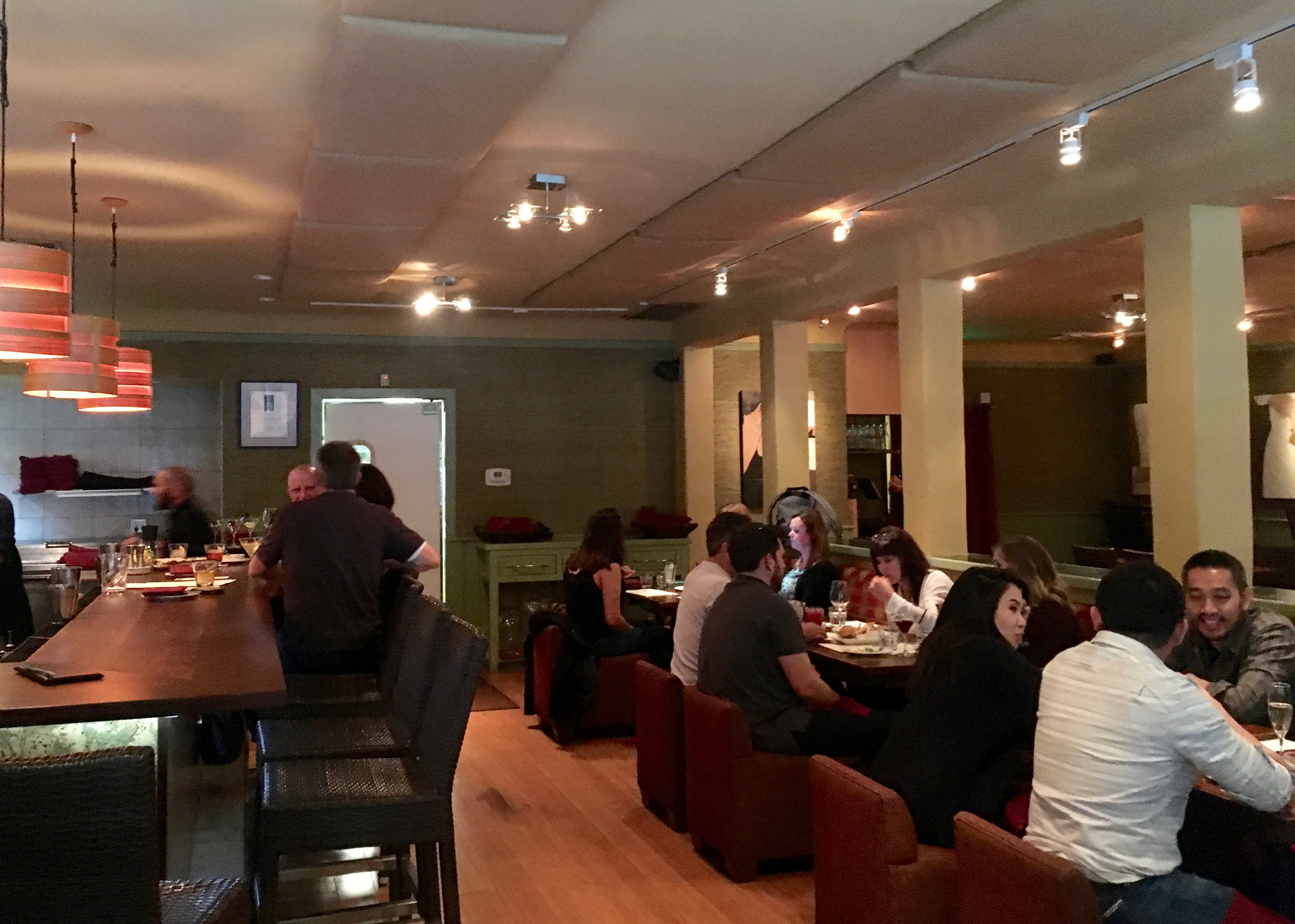 Customers enjoying happy hour at Cin-Cin Wine Bar & Restaurant.