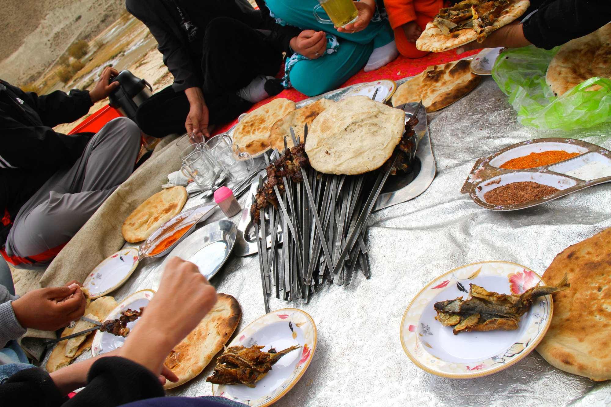 A picnic held in Band-e-Amir National Park, Bamiyan, Afghanistan in 2012. Traditionally, Nowruz marks the start of picnic season in Afghanistan.