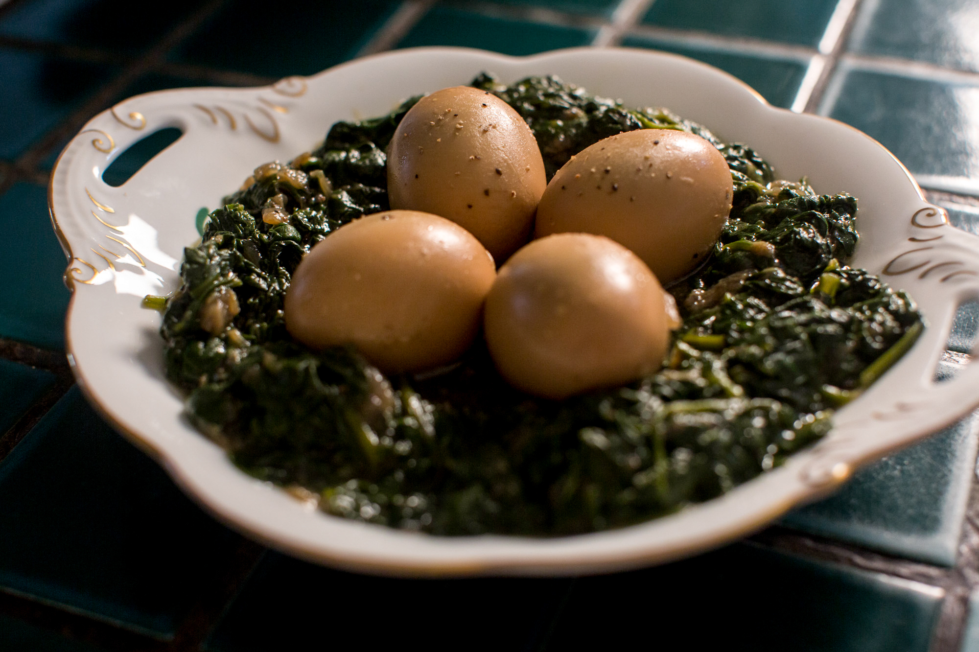 Joan Nathan's recipe for hard-boiled eggs with spinach originated in Greece.
