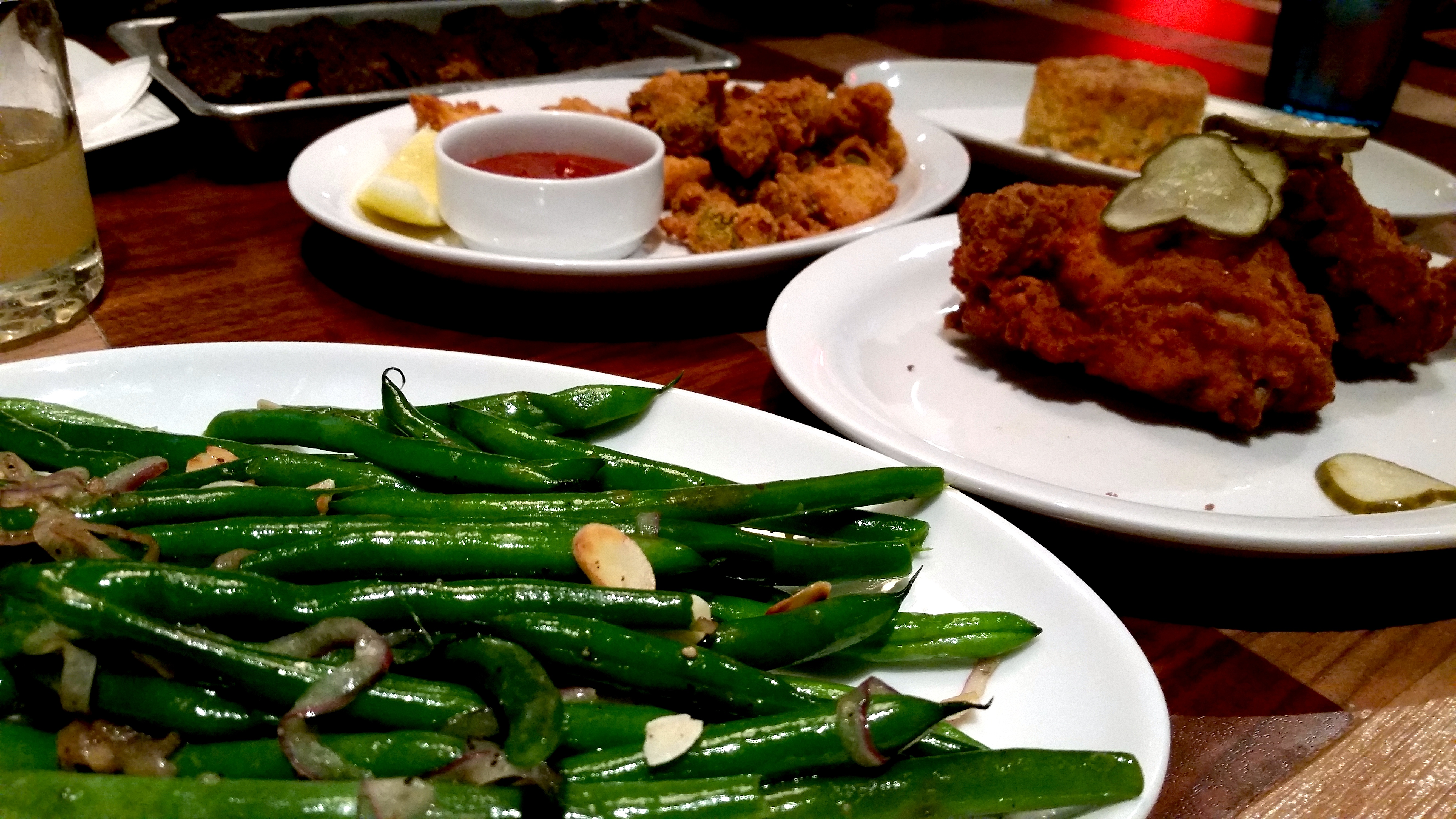 Green beans, chicken, gator bites, and biscuit plates