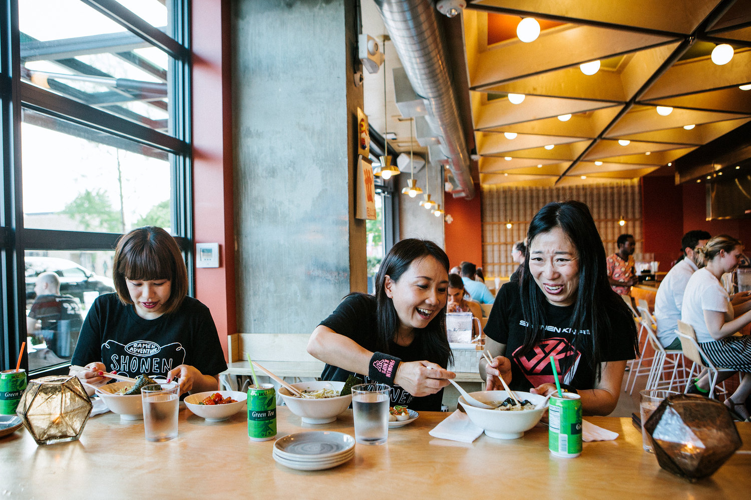 (Left to right) Risa, Naoko and Atsuko of the band Shonen Knife eat ramen at Haikan in Washington, D.C., before playing a show. D.C. was one of their stops on a self-titled "Ramen Adventure Tour" of the U.S. By night, they play gigs. By day, they sample ramen in cities across the country.