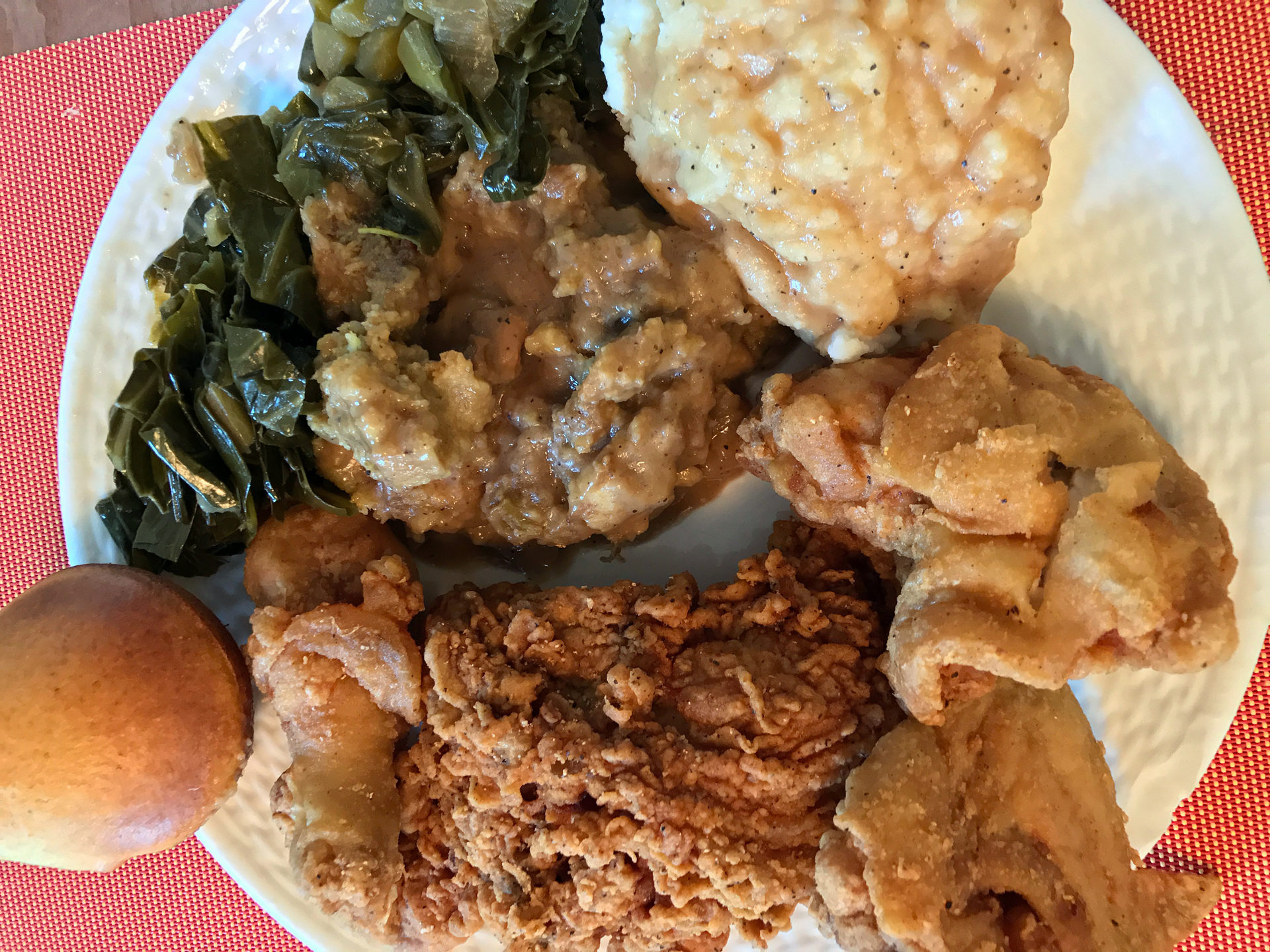 A heaping plate of fried chicken and fixins at Touch of Soul in Oakland.