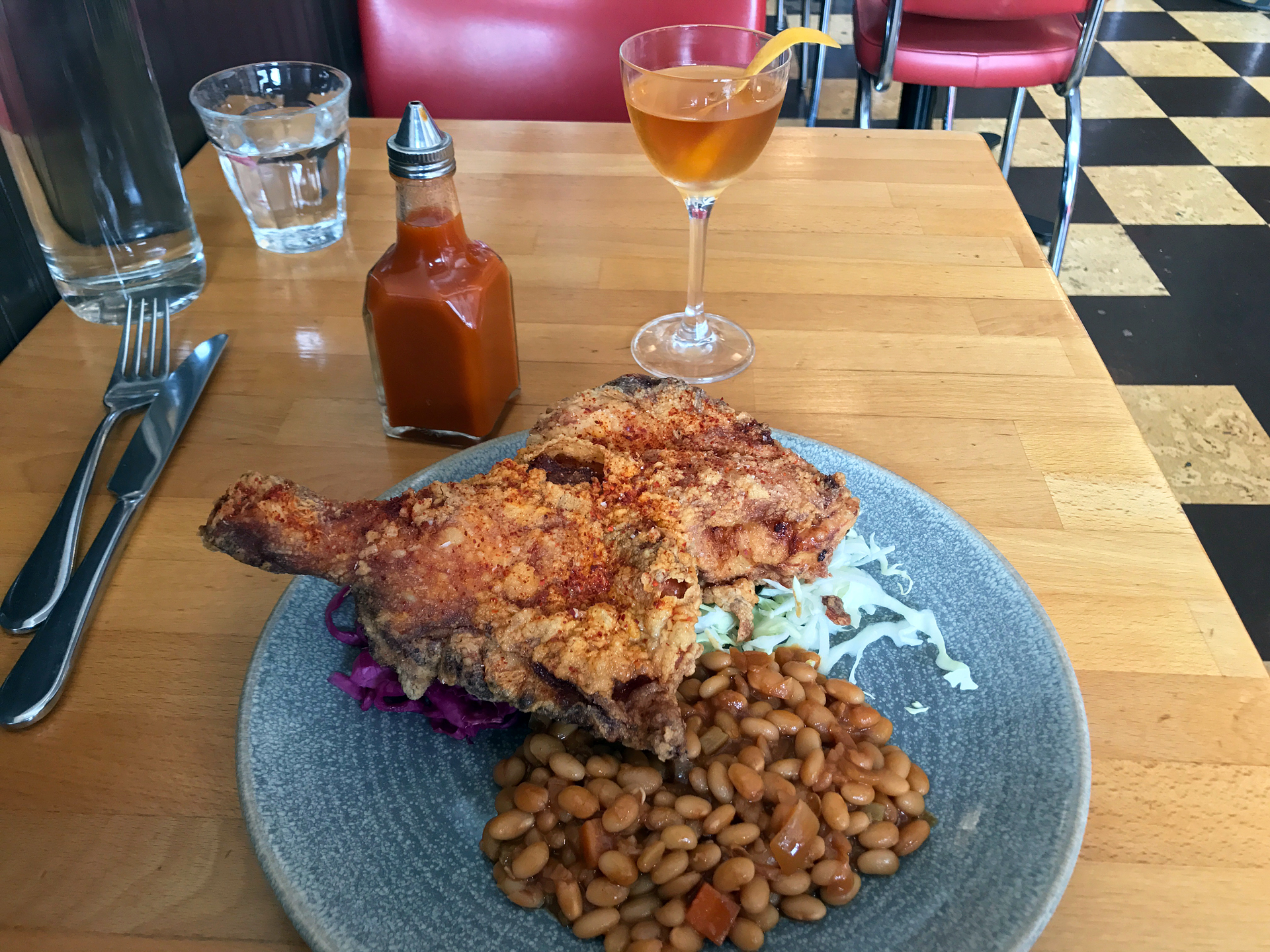 Hopscotch's fried chicken with baked beans and coleslaw.