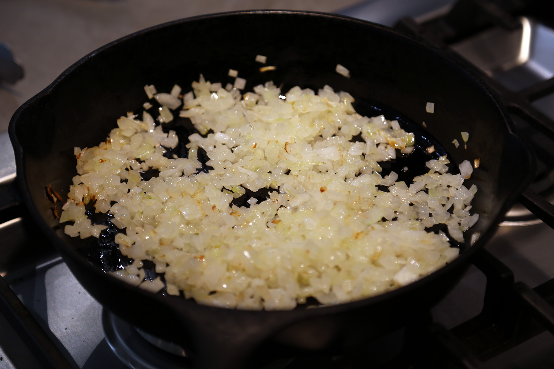 Add the oil to the skillet and heat the oil over medium heat. Add the onion and cook, stirring, until softened and starting to brown, about 8 minutes.