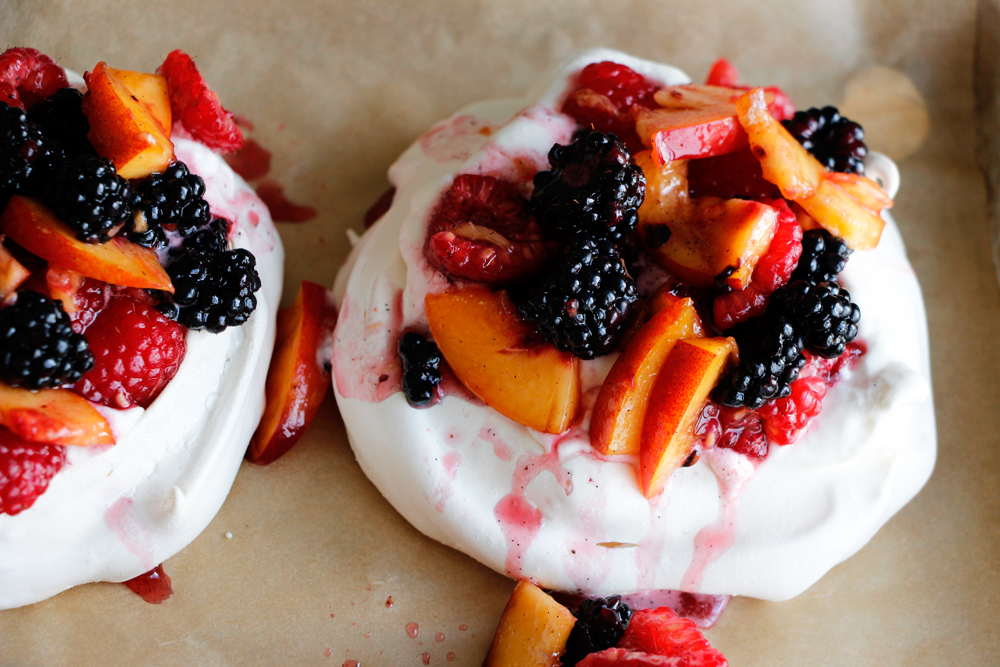 Crispy-Chewy Vanilla Pavlovas with Whipped Cream and Vanilla-Scented Nectarines and Berries.