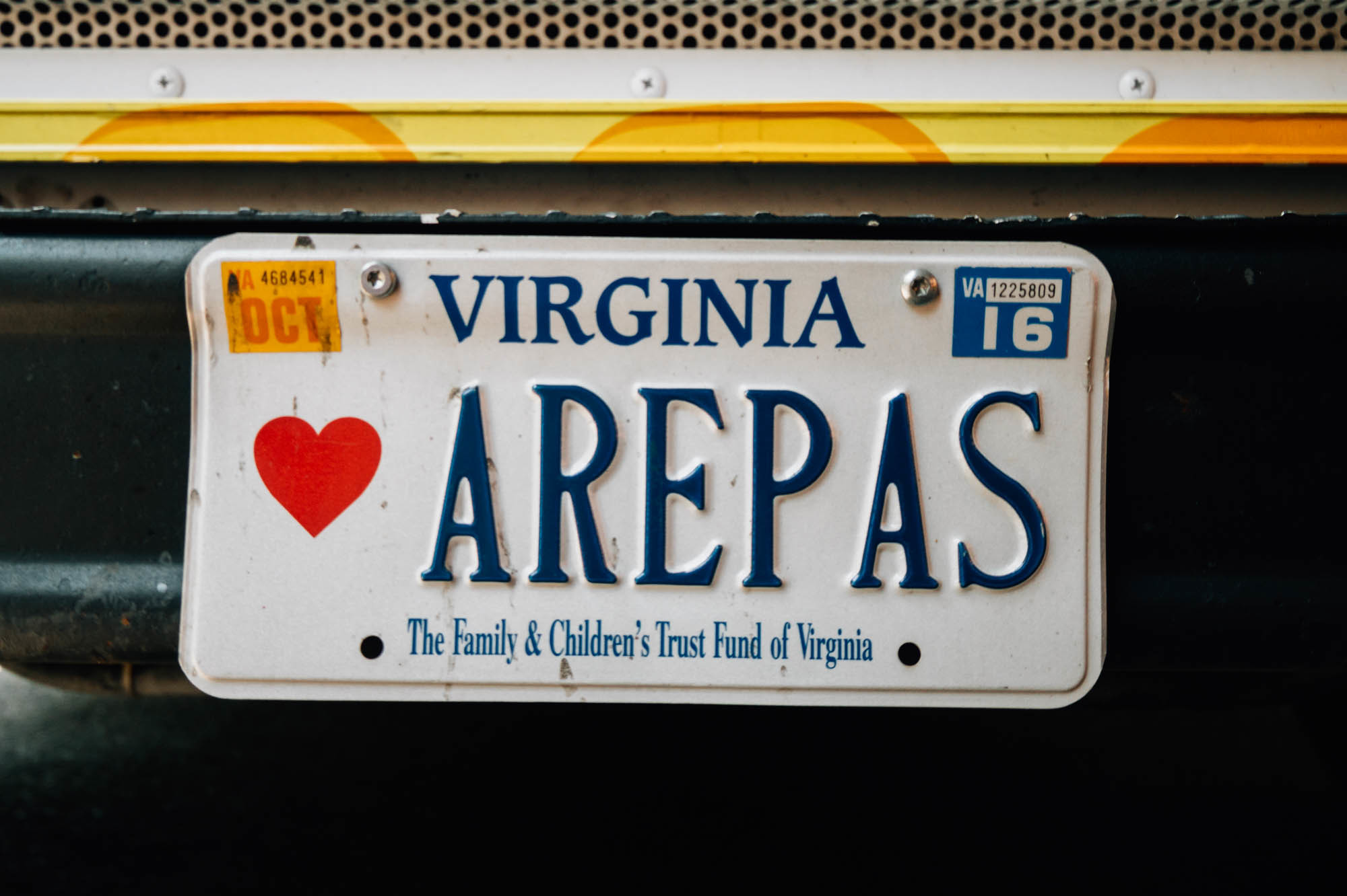 The license plate on the Arepa Zone food truck speaks for many as the arepa's popularity expands worldwide, even though it grows scarce in its native Venezuela.