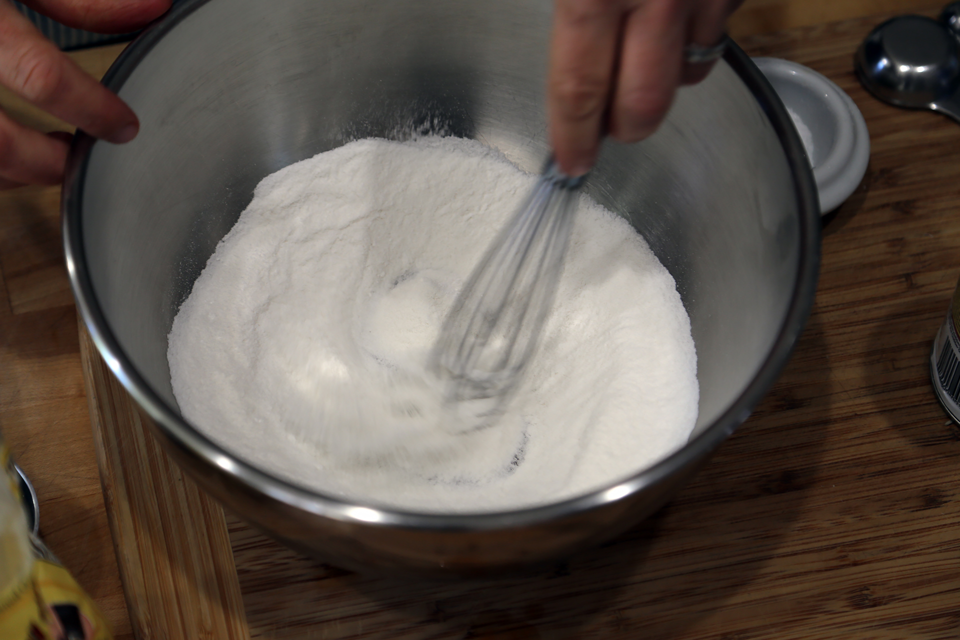 In a large, shallow bowl, whisk together the rice flour, baking powder, and salt.