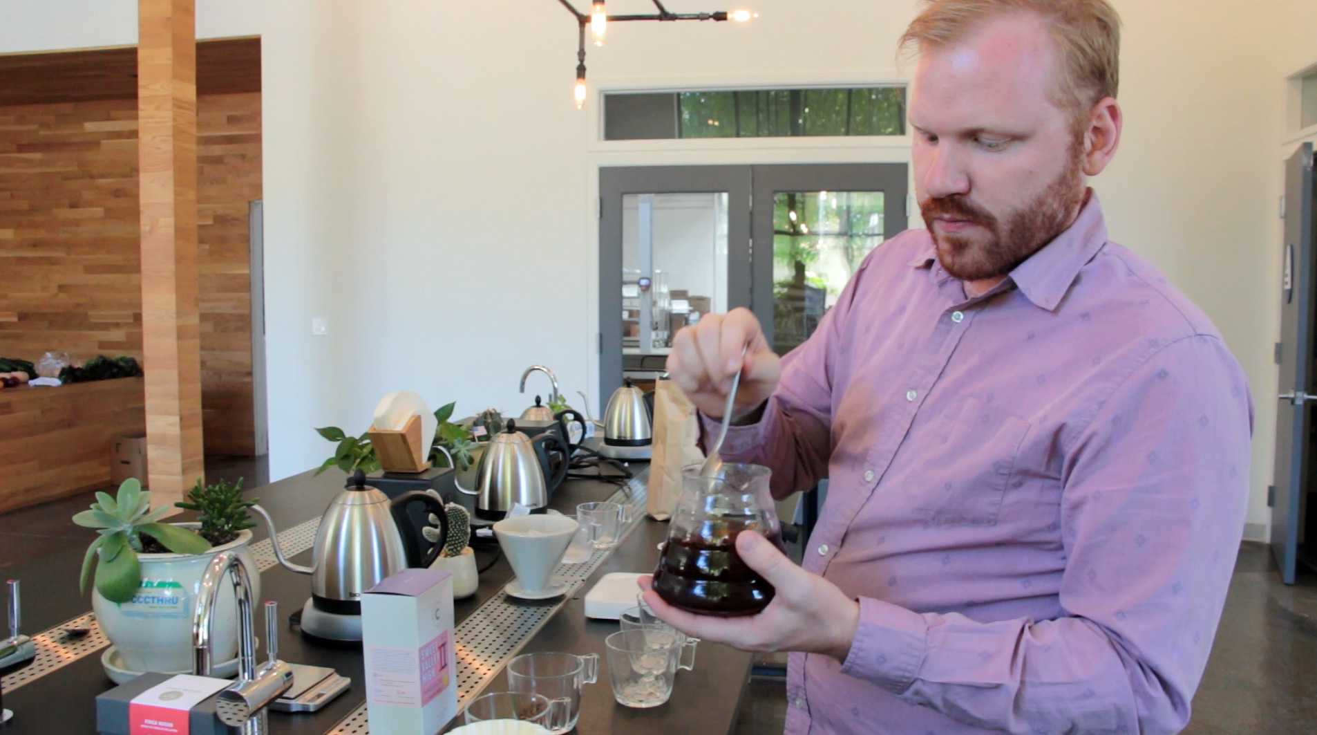 Jesse Bladyka demonstrates how to make flash brewed coffee at Counter Culture