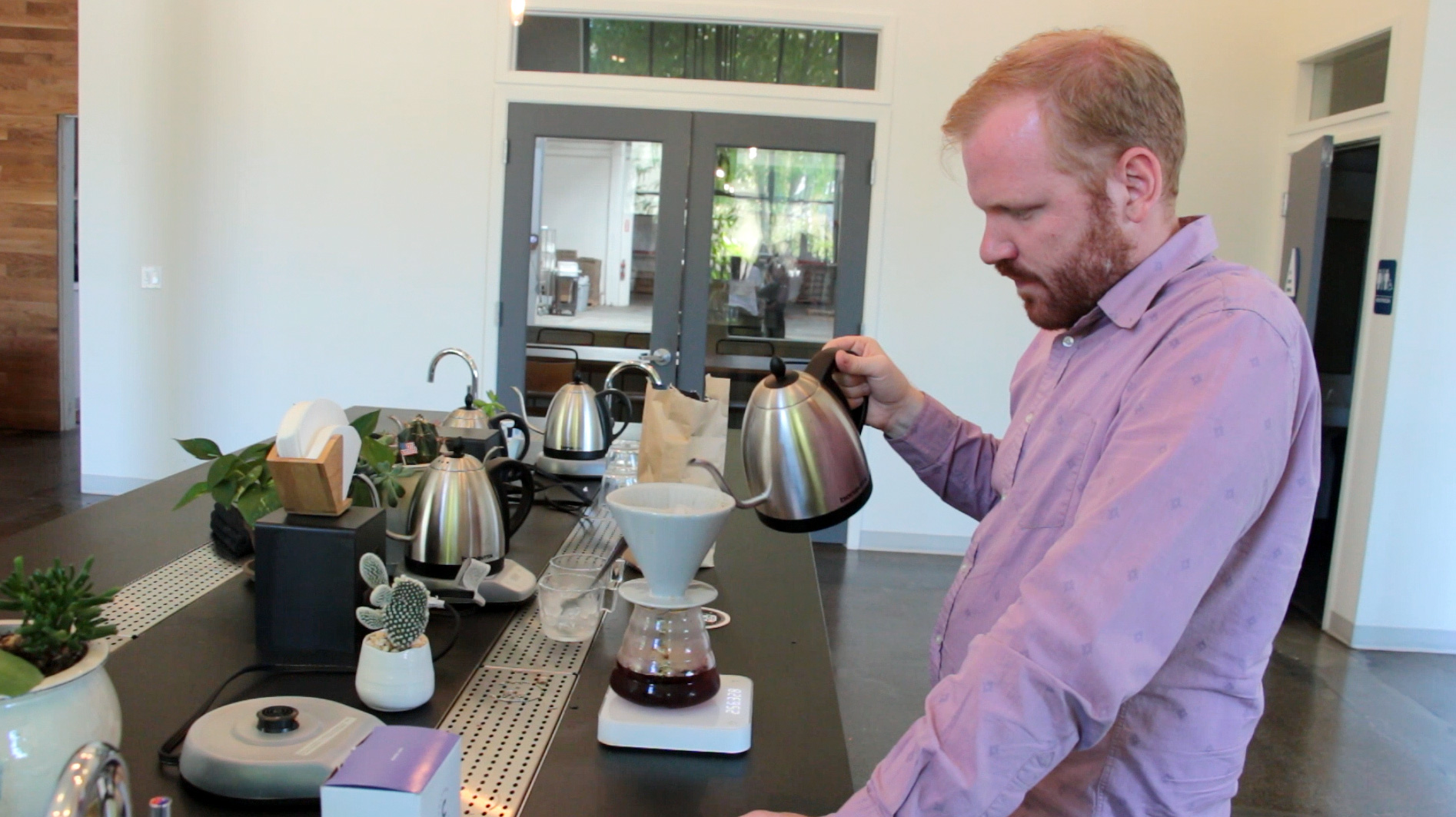 Jesse Bladyka making flash brewed coffee at Counter Culture