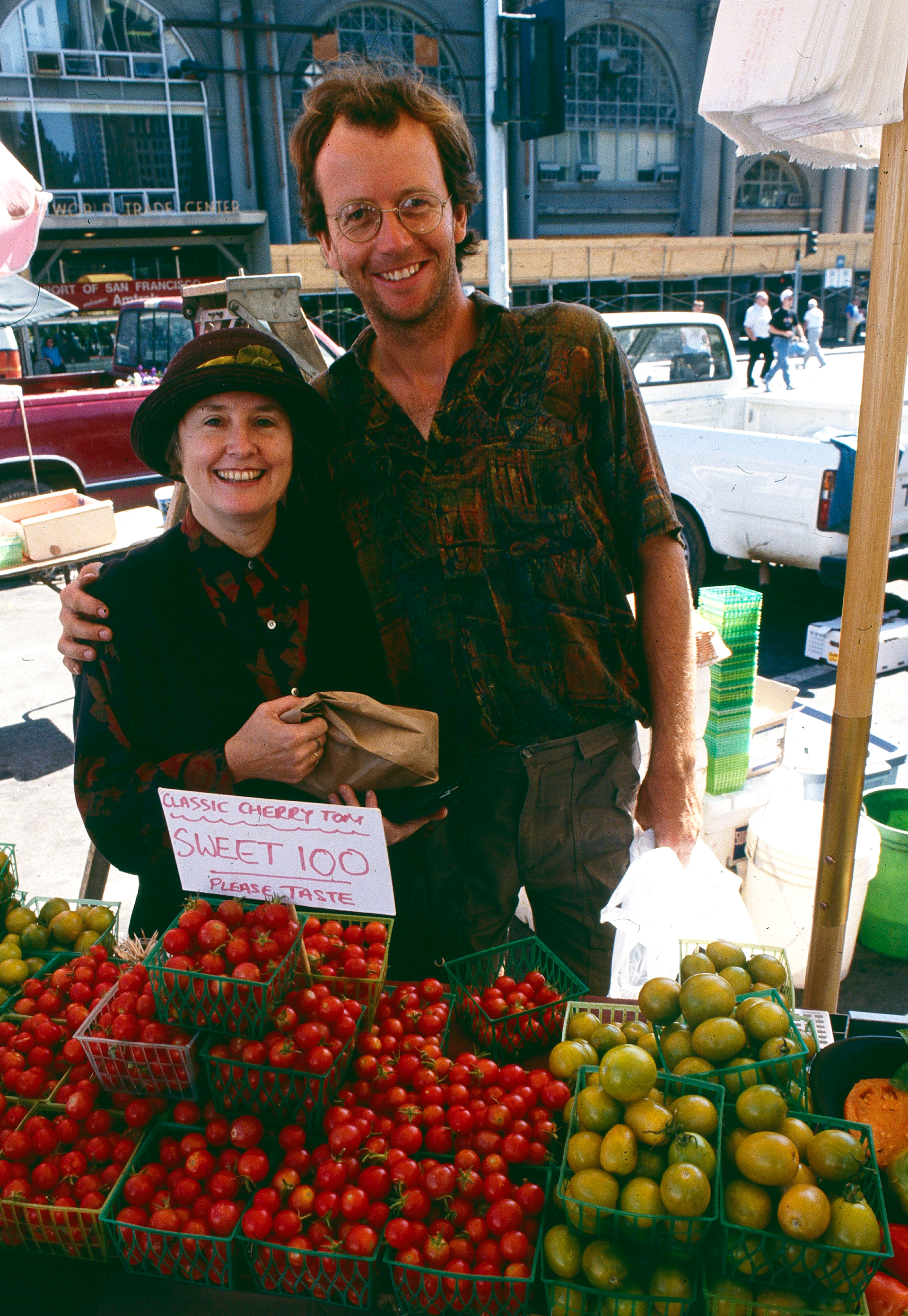 Nigel is shown in the early days of the farmer's market with Alice Waters of Chez Panisse.