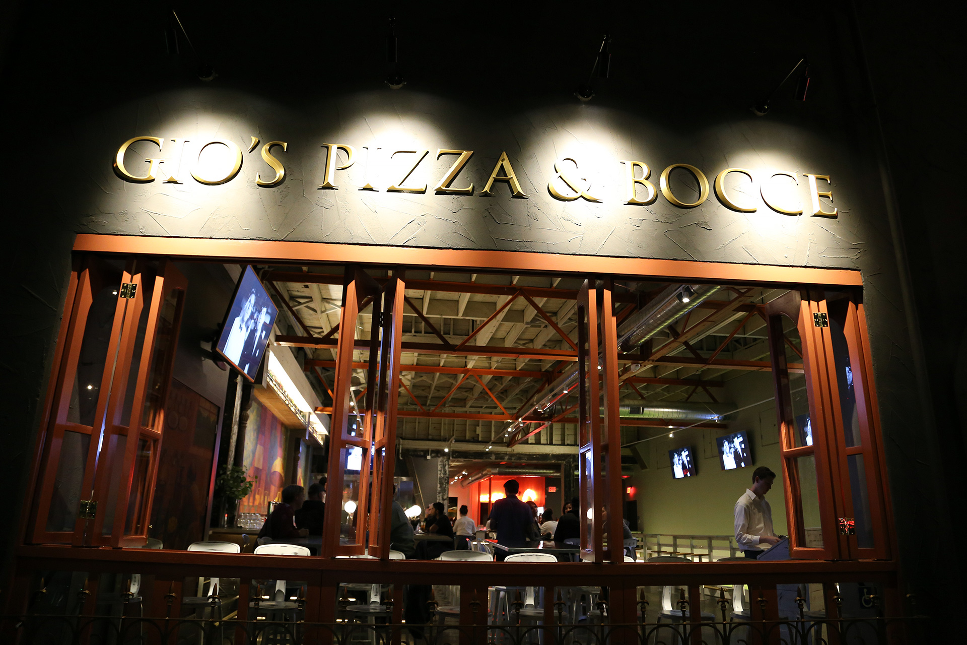 Gio's Pizza & Bocce exterior at night.