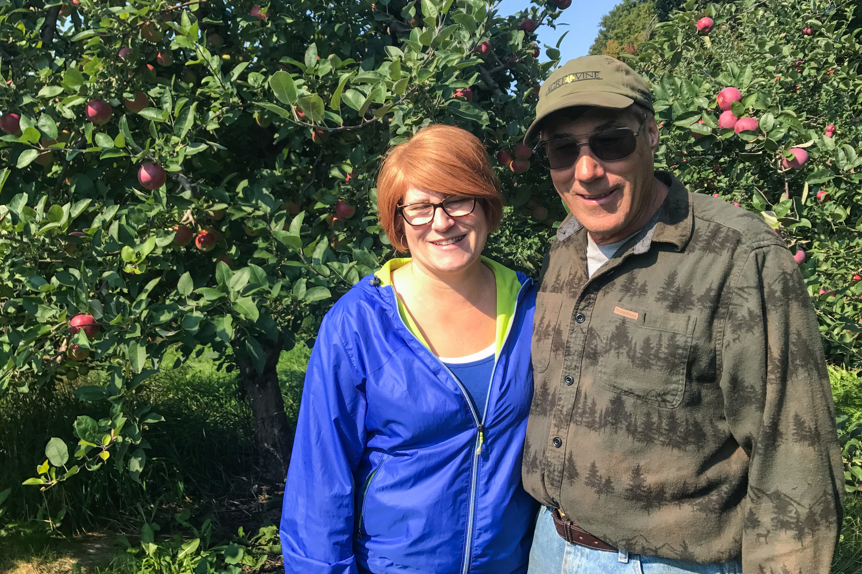 Farm manager Heatherlyn Johnson Reamer is pictured with her father, Dean Johnson, who owns Johnson Farms. Without migrant workers to pick the crops, Reamer says, "There wouldn't be food. It's just as simple as that."