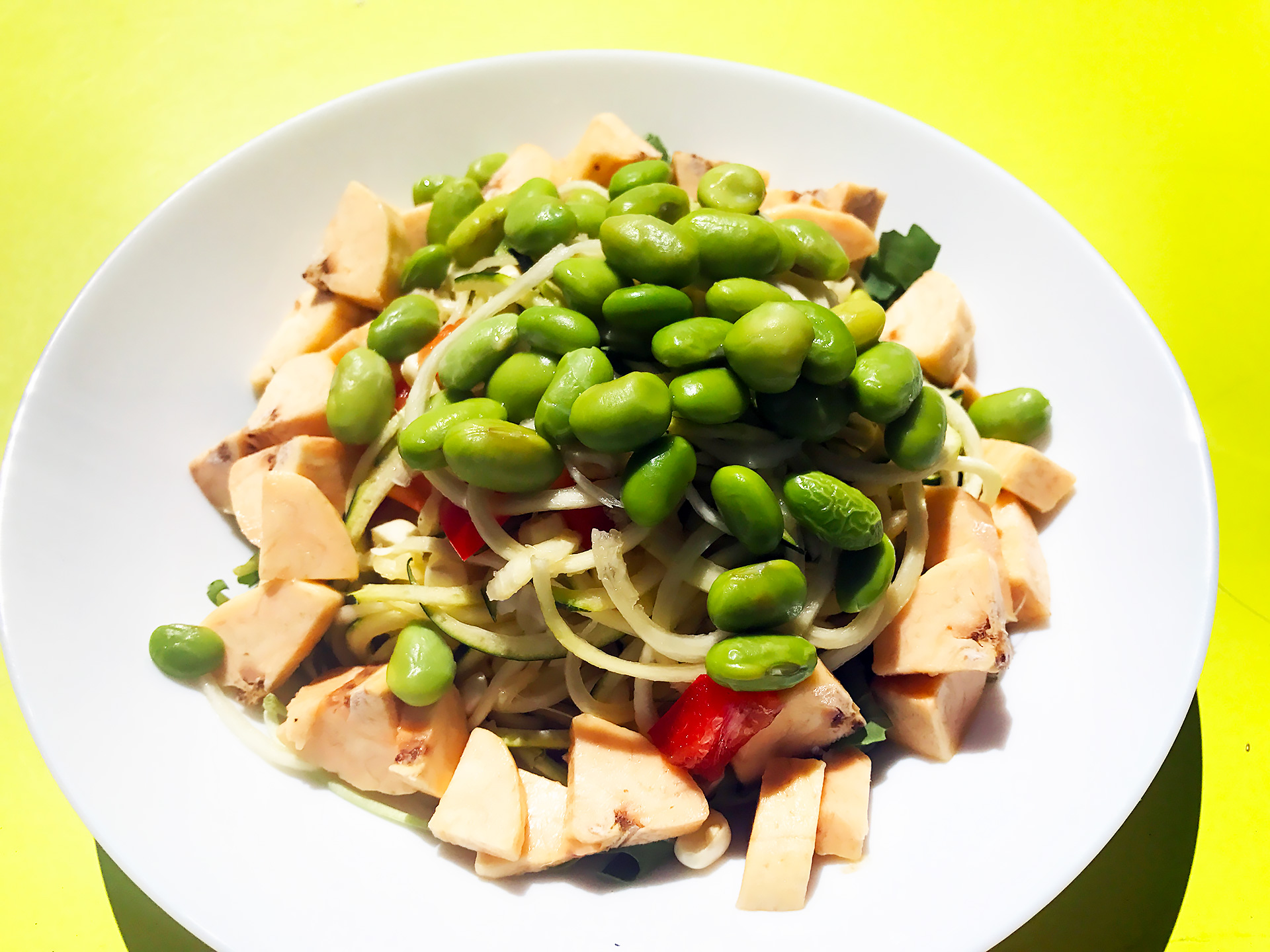A raw plantain salad with edamame.