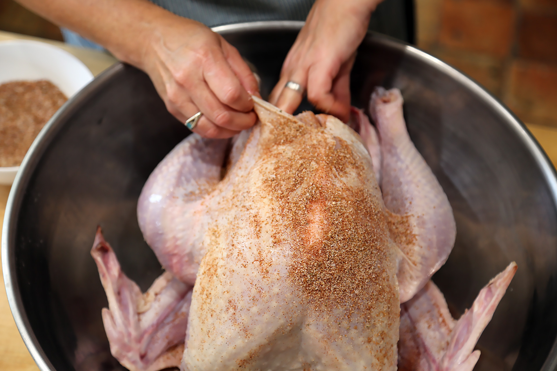Rub the turkey all over the outside and under the skin (as much as possible without tearing) with the spice rub.