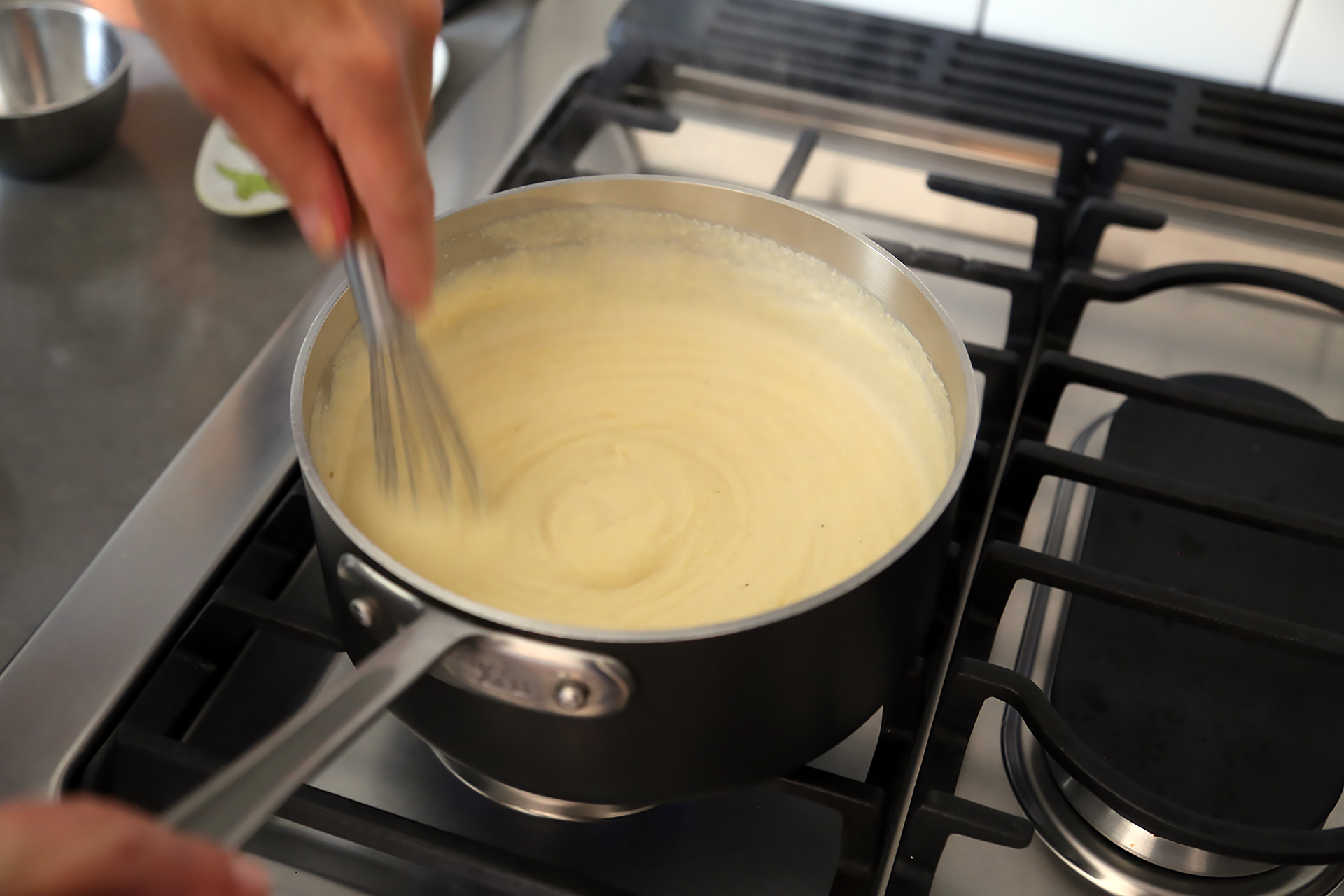 Cook, stirring constantly, until the mixture thickens, 1 or 2 minutes.