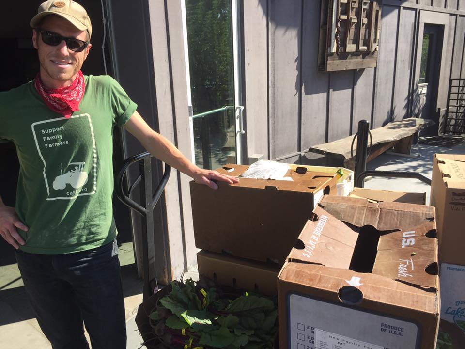 Evan Wiig of The Farmers Guild with produce donations at FEED Sonoma.