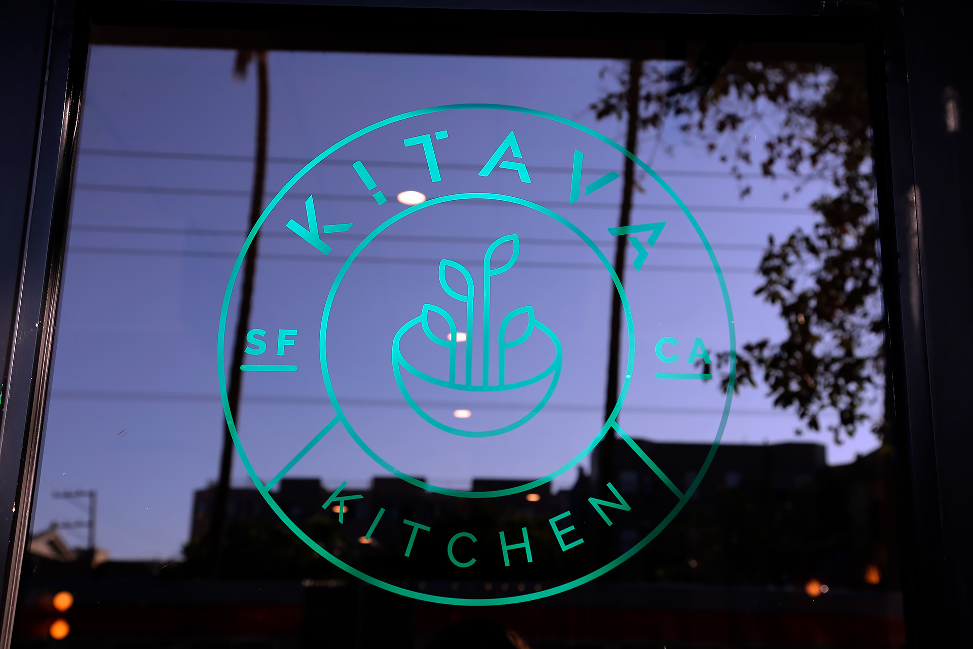 Kitava Kitchen logo on the doorway at Mission and 16th.
