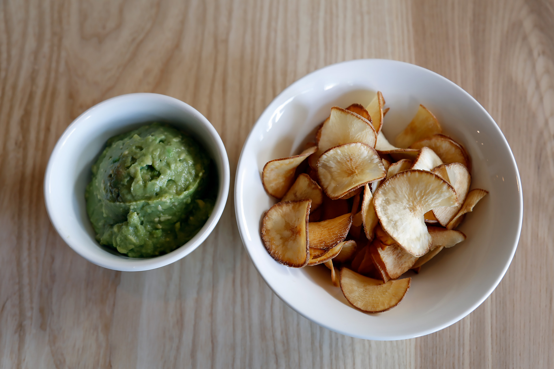 Avocado mash with yucca chips.