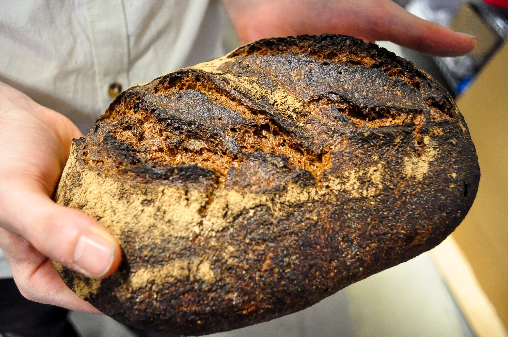 The D.C. bakery's loaves emerge from the oven in dark hues to match their intensely wheat-y flavors.