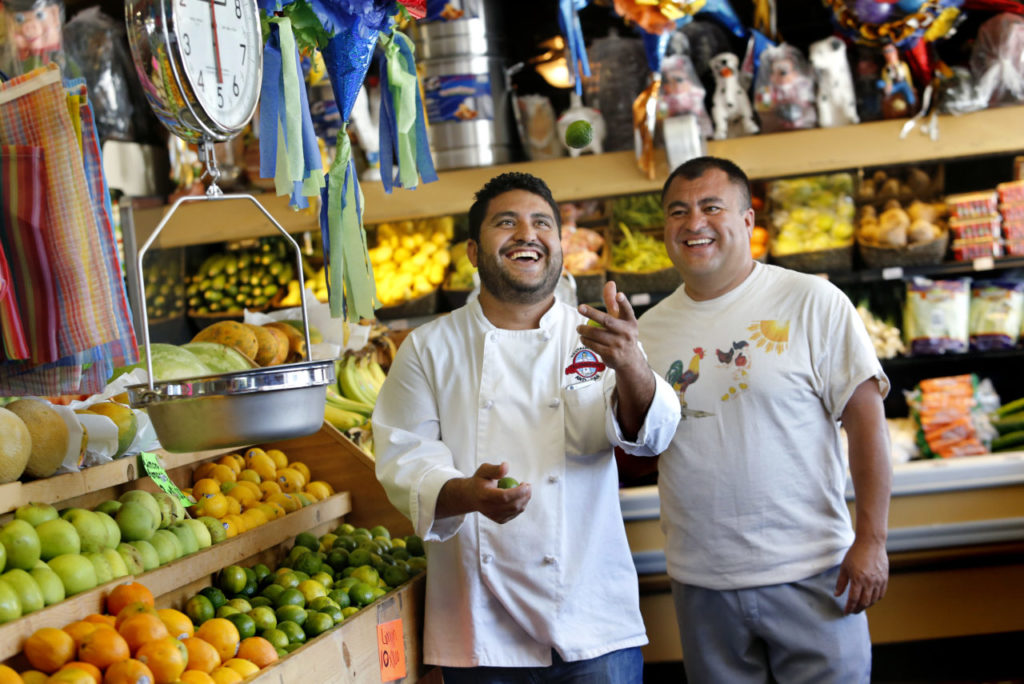 In this photo, Brothers Pedro, left, and Octavio Diaz at their store Casa del Mole Mercado and Carniceria.