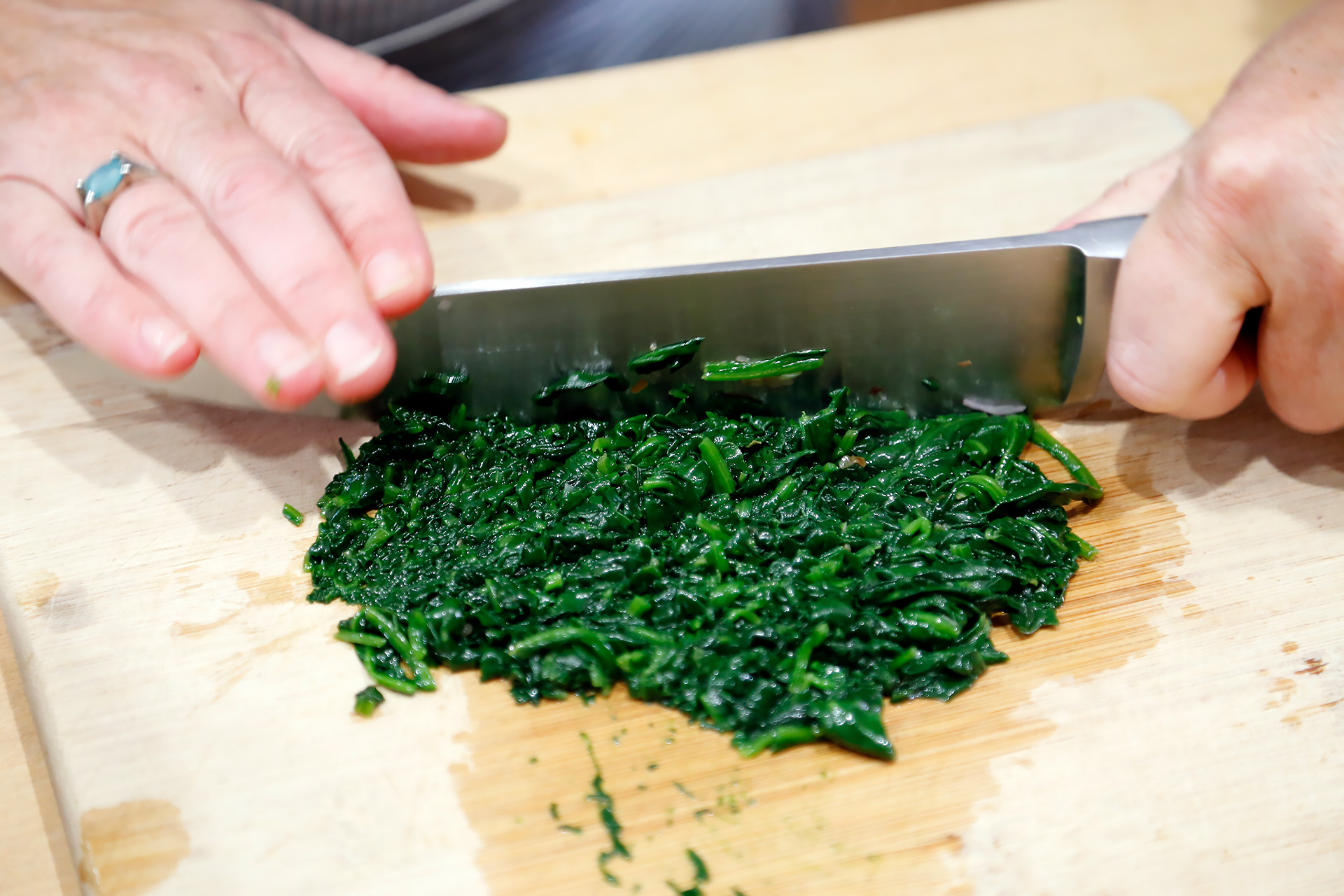 Squeeze out the liquid, transfer to a chopping board, then chop finely.