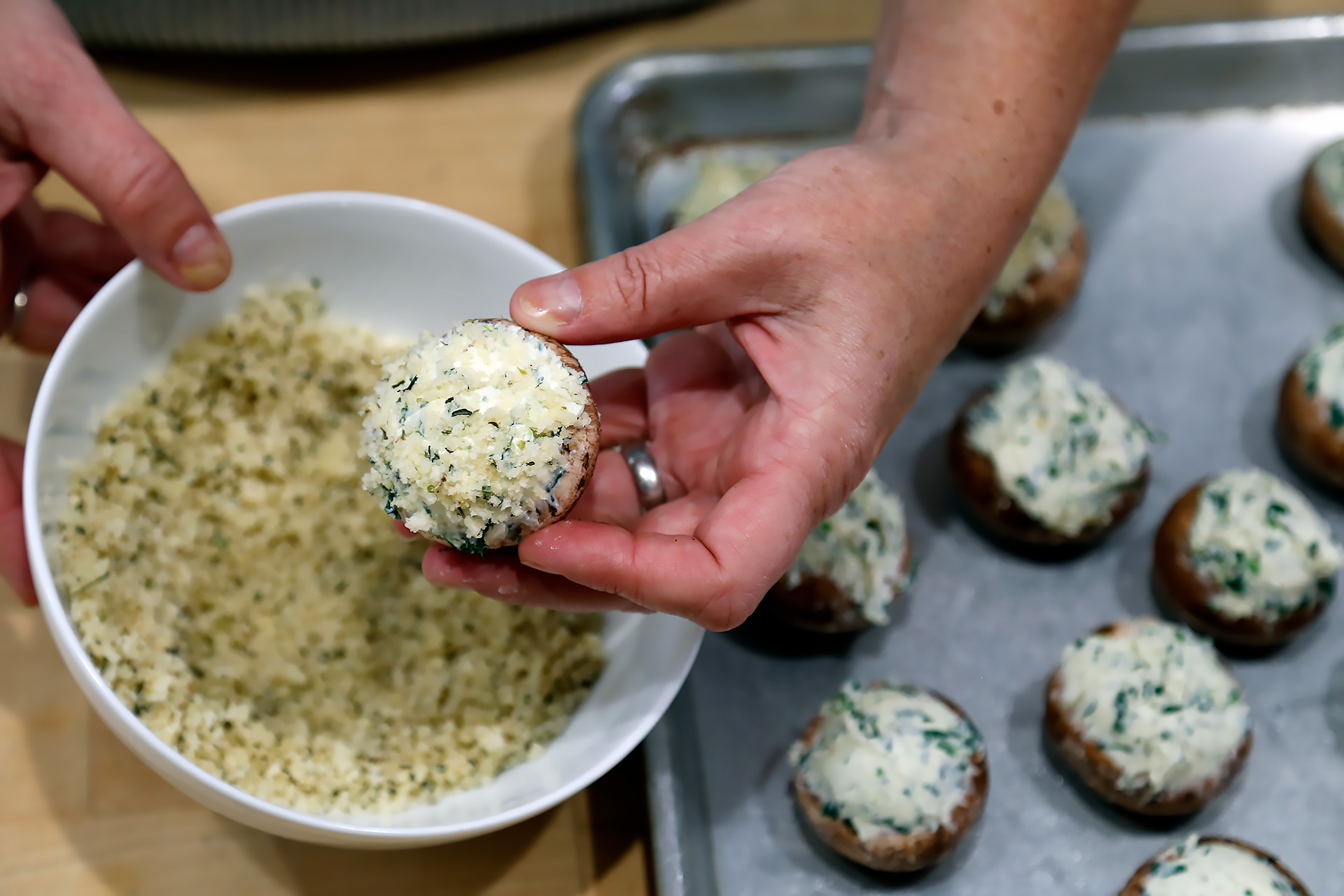 Top the stuffed mushrooms with the panko mixture, pressing it into the filling lightly.