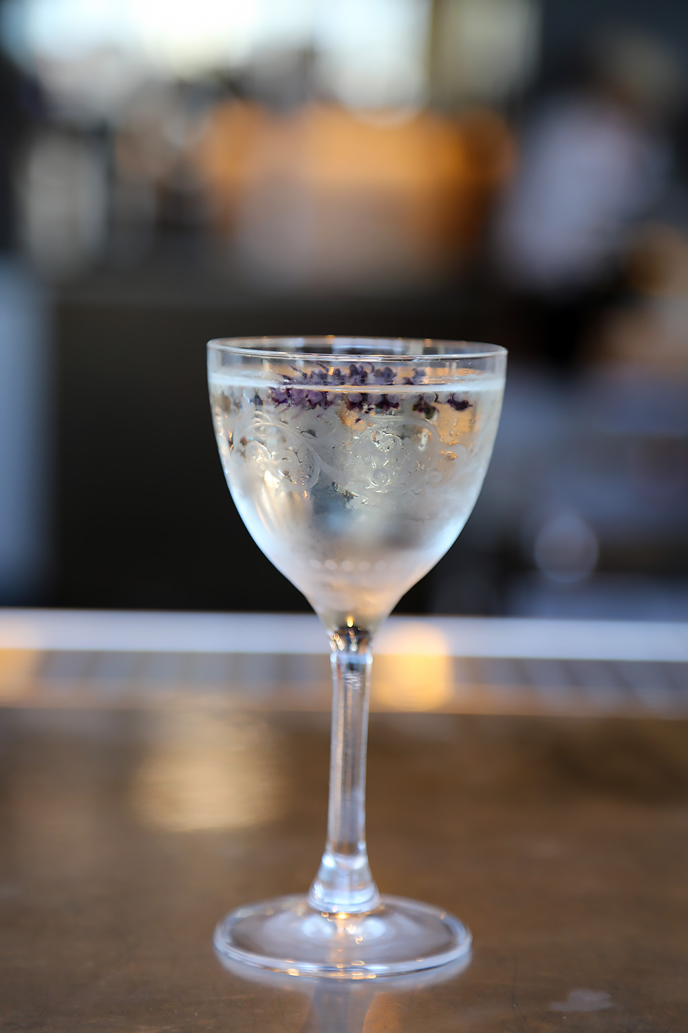 Cocktail: Chile vodka-forward “Basil” mellowed with eau de vie and Dimmi.