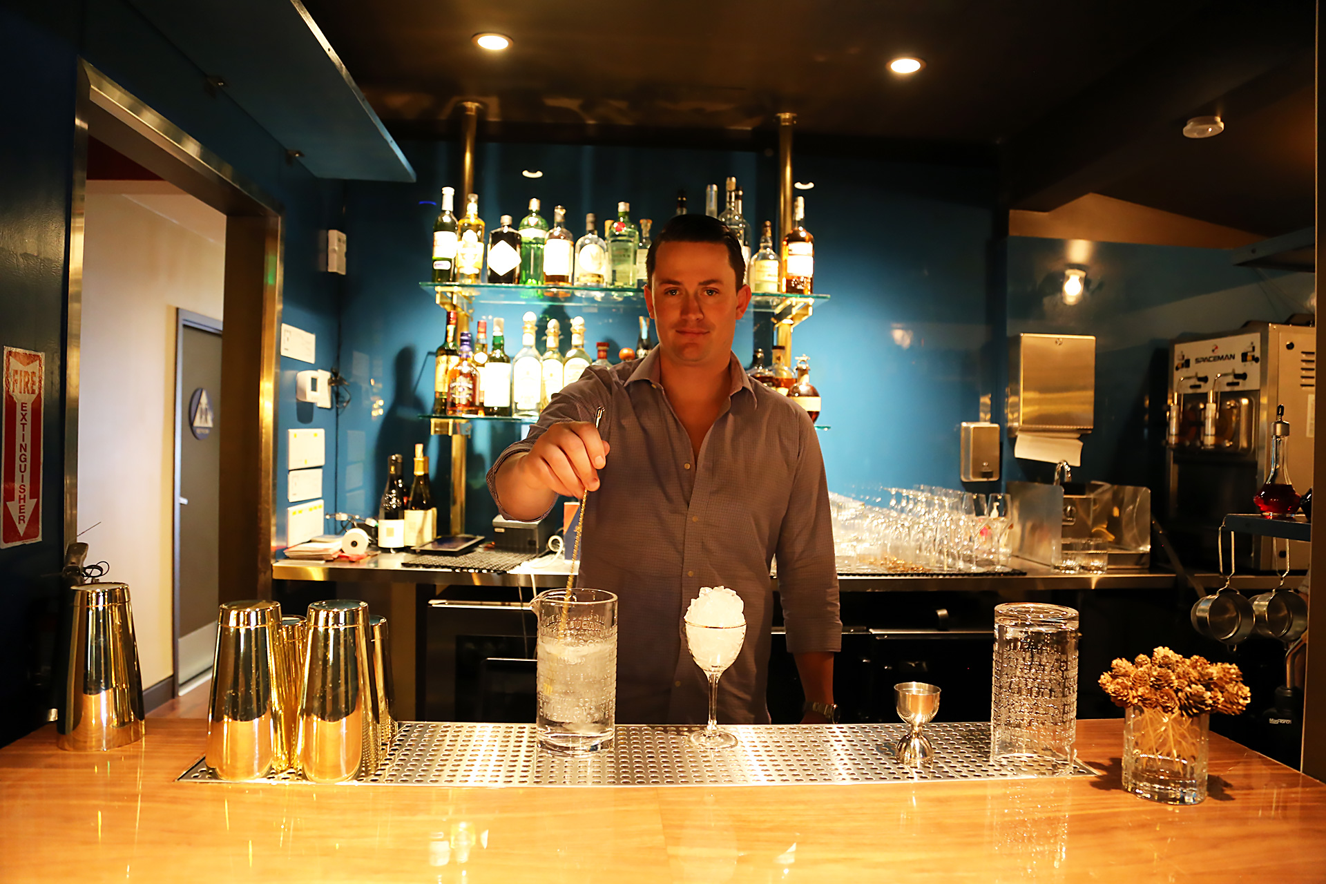 General Manager Tristen Philippart de Foy at the back bar