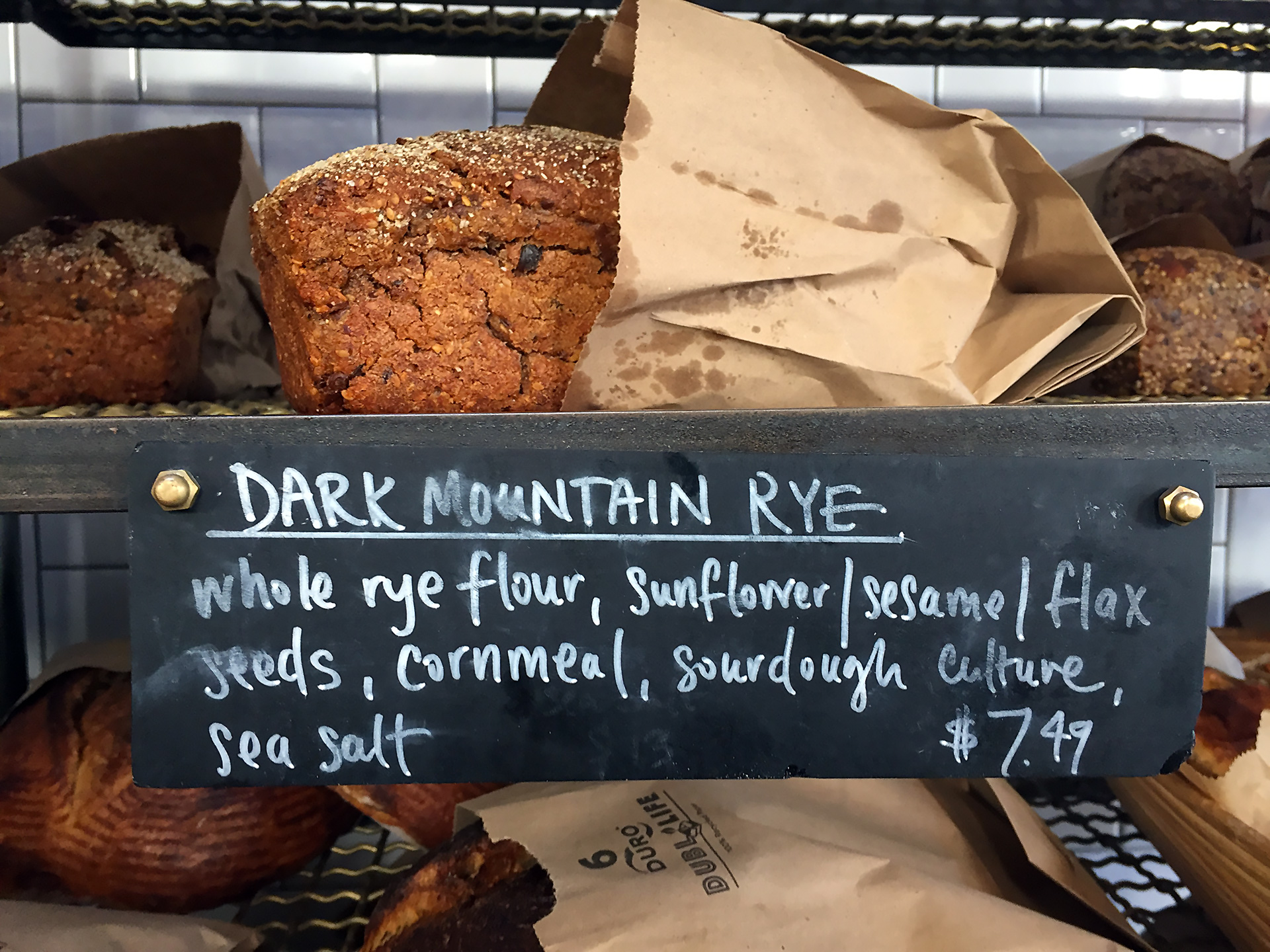 Josey Baker Dark Mountain Rye bread for sale at The Mill.